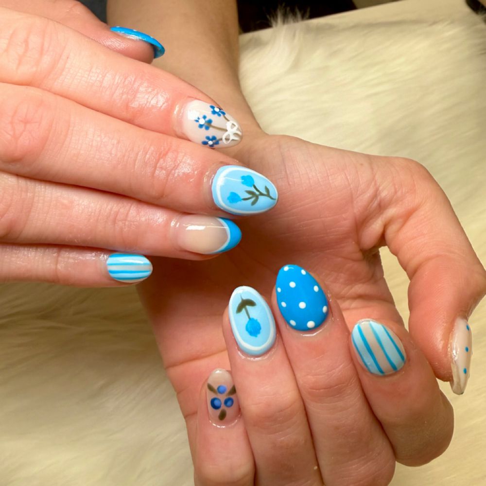 Blue hand-painted nail art